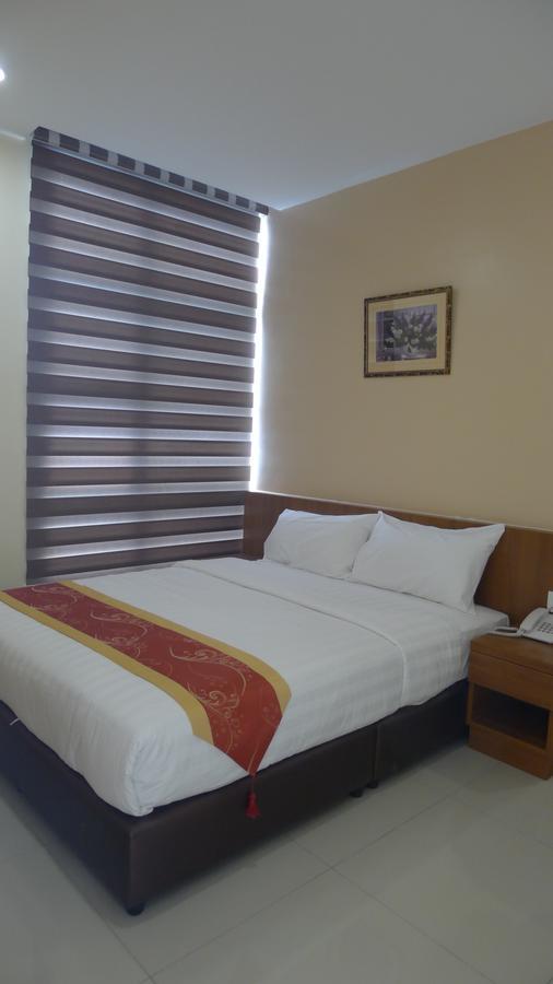 โรงแรมแซมเบอร์เกอร์ แลมบ์ สเปเชียล Malacca ห้อง รูปภาพ
